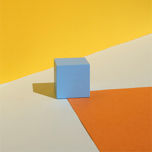 blue block on paper background blue block on paper background