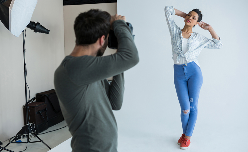 Female model posing for photographer